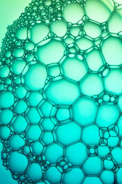 Soyut arka plan biyoloji, makro fotoğraf köpüğü ve eğimli su. Molekül çoklu renk sırtı