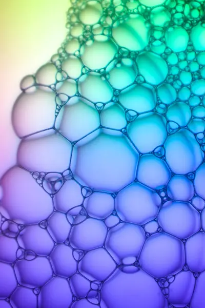 Soyut arka plan biyoloji, makro fotoğraf köpüğü ve eğimli su. Molekül çoklu renk sırtı