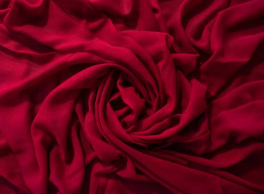 Kırmızı kumaş dalgalı buruşuk arkaplan dokusu.