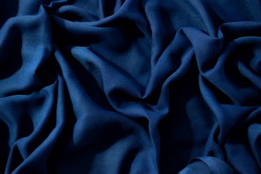 Donanma ya da koyu mavi renkli dalgalı arkaplan dokusu.