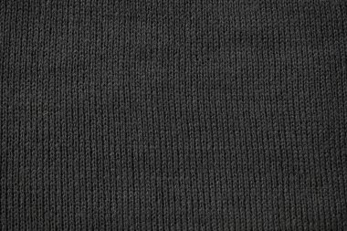 Ayrıntılı koyu gri örgü kumaş arkaplan dokusu.