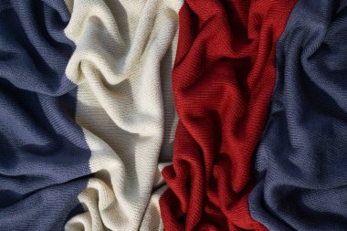 Üç kat renkli gri beyaz süt ve örgü örülmüş kumaş dalgalı arkaplan dokusunda kırmızı.