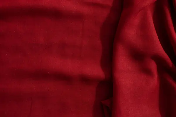 Kopya alanı ile kırmızı kumaş dalgalı buruşuk arkaplan dokusu.