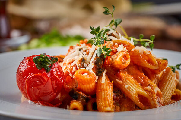 Close-up of pasta with a little cheese and oregano