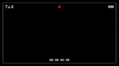 Siyah arkaplanda parlayan sembollerle video kamera arayüzü