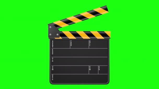 緑の背景に隔離されたクラッパーボード — ストック動画