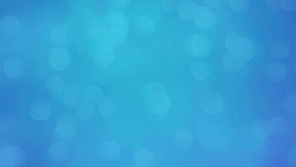 ボケーで抽象的な青い輝く円の背景 ブルーボケモーションバックグラウンド — ストック動画