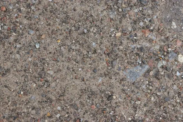 Doğal Çakıl ve Kum Dokusunun Çok Renkli Çakıl Taşları ve Organik Parçacıklarla Yüksek Çözünürlüklü Yakın Çekimi