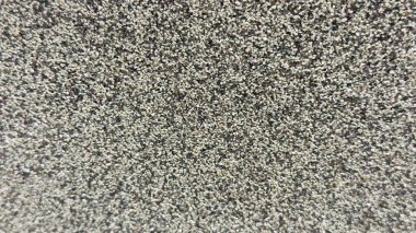 Renk, parçacık boyutu ve doku olarak karşıtlığı göstermek için yan yana yerleştirilen iki granüler dokunun karşılaştırılması açık ve koyu toplam yüzeyler.