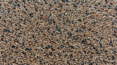 Kahverengi, Siyah ve Beyaz Çakıl Taşları 'nın Granüler Yüzeyi Tasarım, İnşaat ve Eğitim Kullanımı İçin Doğal Doku