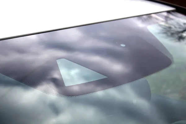 stock image Cameras built into the windshield, along with other Sensors, to provide features like Emergency Braking, Lane Keep Assist and Lane Departure Warning System. ADAS (Advanced Driver Assistance Systems).