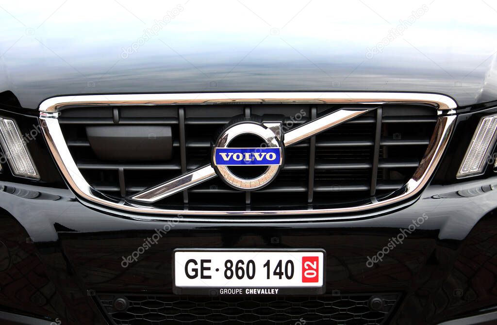 Vinnytsia, Ukraine; March 23, 2024. Black Volvo XC60 radiator grill. SUV Volvo XC60 front bumper. Volvo XC60 emblem and logo. Swiss car number. Front view.