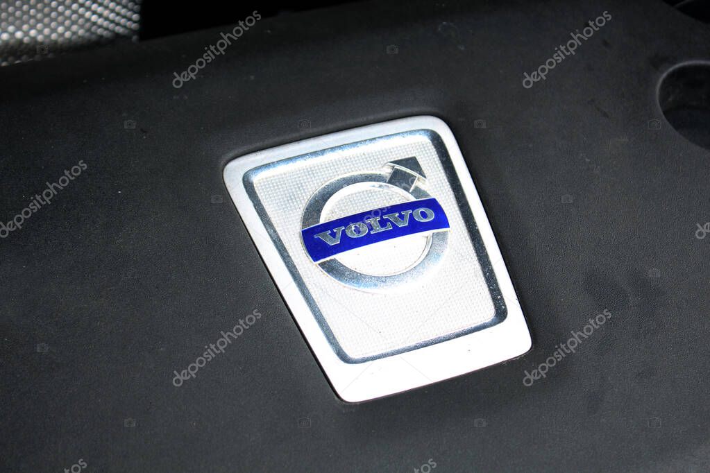 Vinnytsia, Ukraine; March 23, 2024. Volvo XC90 logo on car engine cover. SUV Volvo XC60 diesel engine. Volovo emblem.