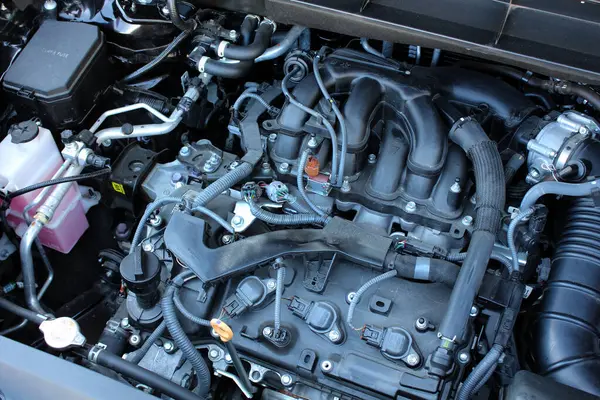 Close up 3.5 V6 gasoline engine. Close up detail of new car engine. Modern car engine parts.