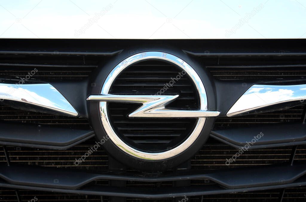 Vinnytsia, Ukraine; May 21, 2025. Opel Movano Logo. Opel Movano emblem on radiator grille. Close up crome Opel logo. Close up crome emblem Opel.