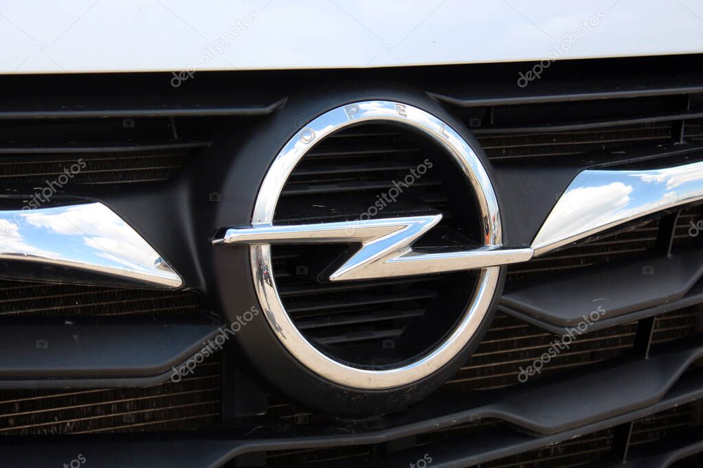 Vinnytsia, Ukraine; May 21, 2025. Opel Movano Logo. Opel Movano emblem on radiator grille. Close up crome Opel logo. Close up crome emblem Opel.