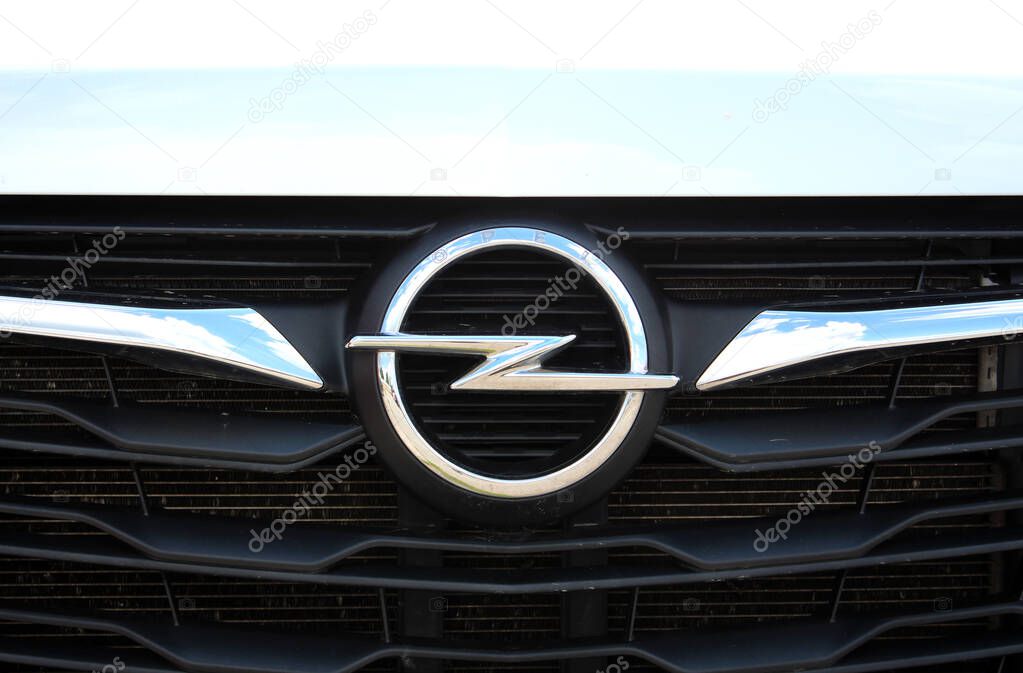 Vinnytsia, Ukraine; May 21, 2025. Opel Movano Logo. Opel Movano emblem on radiator grille. Close up crome Opel logo. Close up crome emblem Opel.
