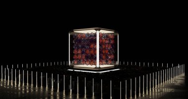 İçinde kırmızı ve mavi kareler olan bir küp. Küp siyah bir arka planla çevrilidir. Küpler birbirlerine bağlıymış gibi görünecek şekilde sıralanmış.