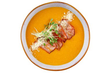 Lezzetli mercimek çorbası, domuz pastırması ve maydanozlu.,