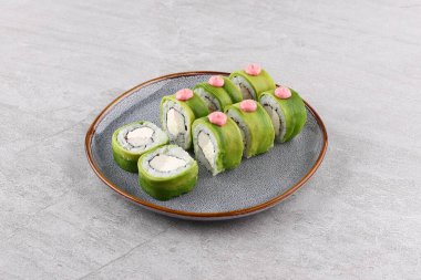 Japanese cuisine. Sushi roll on white background