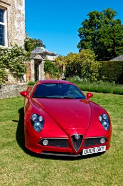 Salisbury, Wiltshire, UK - June 7, 2015: An Alfa Romeo 8C Competizione Sports Coupe                                                   clipart