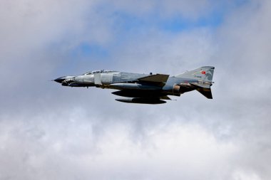 RAF Fairford, Gloucestershire, England, UK - July 22 2024: A Turkish Air Force McDonnell Douglas F-4E Phantom II, 77-0286, departs the 2024 Royal International Air Tattoo at RAF Fairford, England, UK clipart