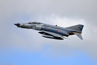 RAF Fairford, Gloucestershire, England, UK - July 22 2024: A Turkish Air Force McDonnell Douglas F-4E Phantom II, 77-0286, departs the 2024 Royal International Air Tattoo at RAF Fairford, England, UK clipart