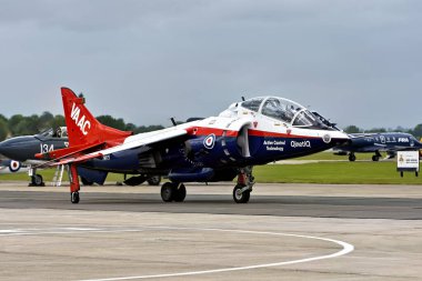 RNAS Yeovilton, Somerset, UK - July 5, 2008: The Vectored-thrust Aircraft Advanced Control (VAAC) British Aerospace Harrier T4, XW175, operated by QinetiQ at the RNAS Yeovilton International Air Day clipart