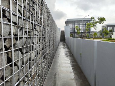 Architectural Exterior, Modern Industrial Walkway with Stone and Metal Eskrim