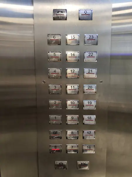 stock image Close-up of Elevator Control Panel with Floor Buttons in High-Rise Building