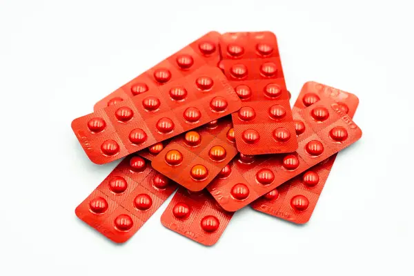 stock image Detailed shots of Methycobal 500mg in red blister packs, supporting nerve function and treating vitamin B12 deficiency.