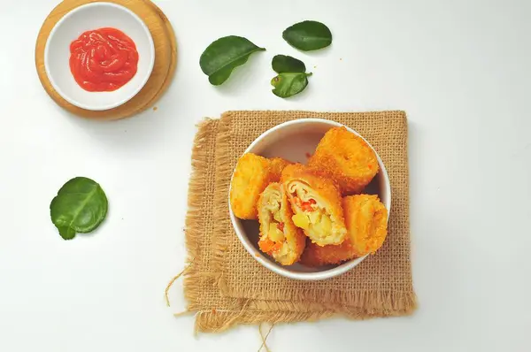 Stock image risoles with vegetable filling in a white bowl, Indonesian food