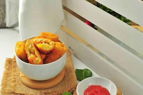 stock image risoles with vegetable filling in a white bowl, Indonesian food