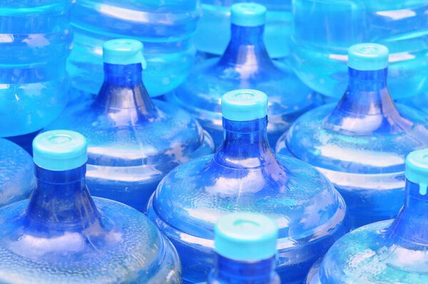 drinking water in neatly arranged gallons