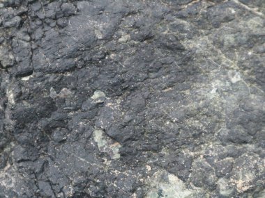 Siyah taş yüzeyini kapat, pürüzsüz doku, sıkı..