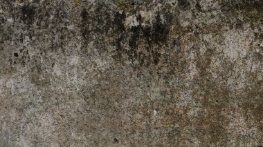 Dokulu yüzeyi ve aşınmış boya arkaplanı olan duvar