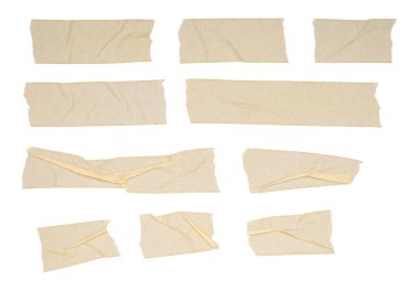 Bir çift buruşuk bej maskeleme bandı.