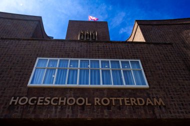 Rotterdam, the Netherlands, 07 15 2024: Hogeschool Rotterdam front entrance in frog perspective clipart