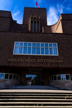 Rotterdam, the Netherlands, 07 15 2024: Hogeschool Rotterdam front entrance in frog perspective clipart