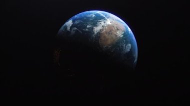 Sinema Gezegeni Dünya Afrika 'nın karanlık tarafından yavaşça yörüngeye giriyor.
