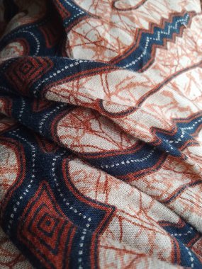 Endonezya 'dan güzel geleneksel kahverengi batik pul kumaş deseni. soyut doku 