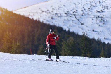 Sunny Ski Day Selfie: Adventurous Woman Snaps Photo While Shredding the Mountain
