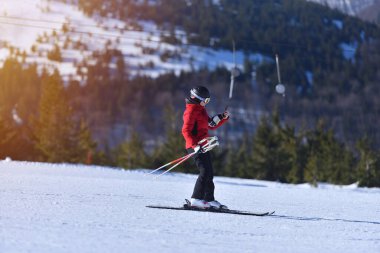 Sunny Ski Day Selfie: Adventurous Woman Snaps Photo While Shredding the Mountain