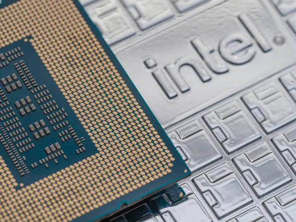 stock image Intel logo on an Intel Core 14th gen i9-14900K processor case, focus on CPU connectors