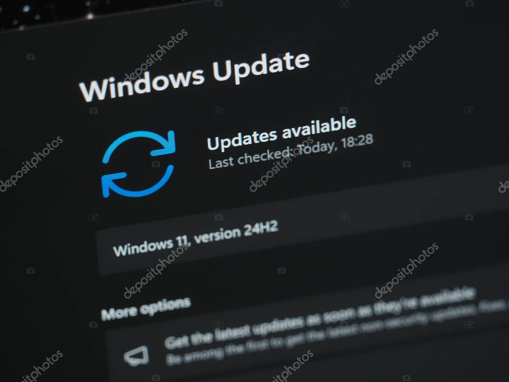 Galati, Romania - December 13, 2024: Checking for 24H2 Windows 11 updates on laptop screen close up view