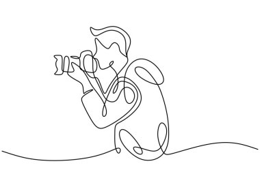 One line drawing of a photographer. A man with a camera capturing moments in a continuous line drawing style. clipart