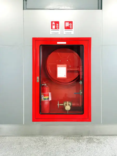 Fire hose cabinet in an office building to prepare for fire protection.