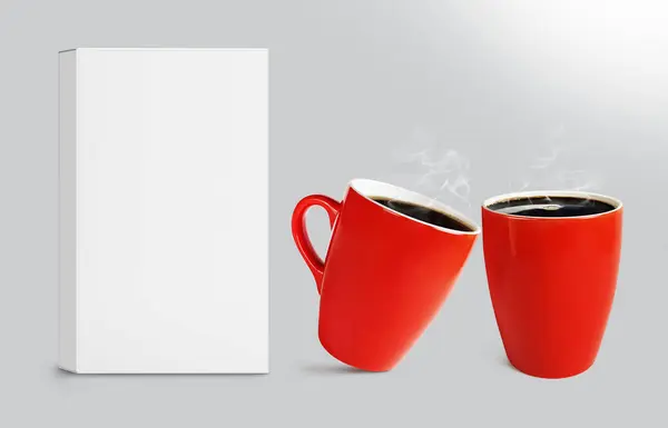 red coffee mug with empty packaging box mockup isolated on gray background
