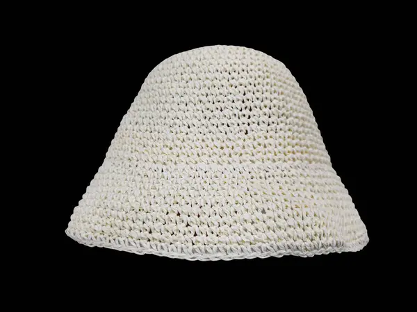 white knit bucket hat isolated on black background