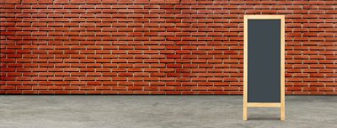 Mesaj yazmak için alanı olan klasik ahşap karatahta, kırmızı tuğla arka plan.